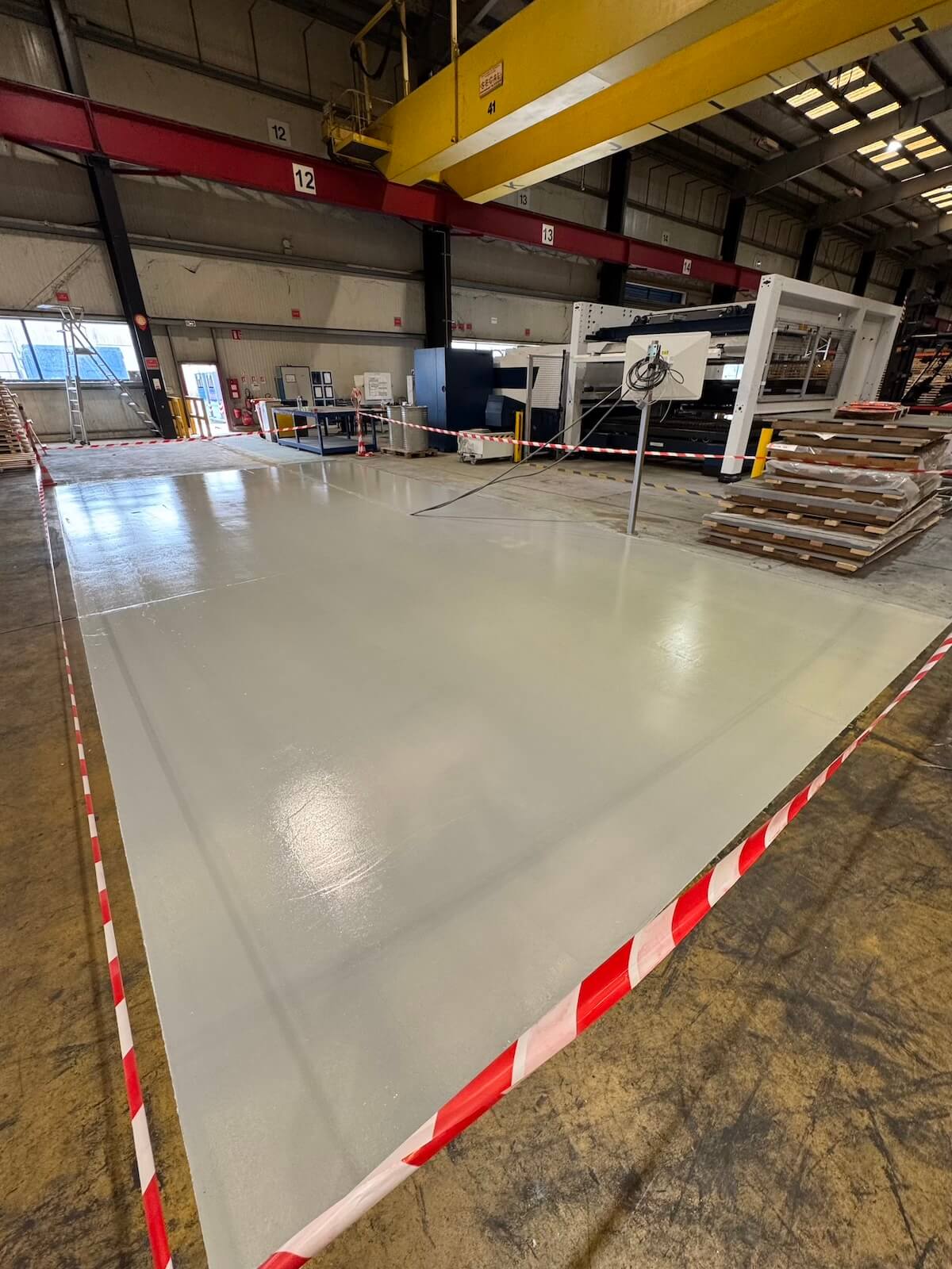 Résine Industrie - Protection de sol filmogène haute résistance pour sites métallurgiques